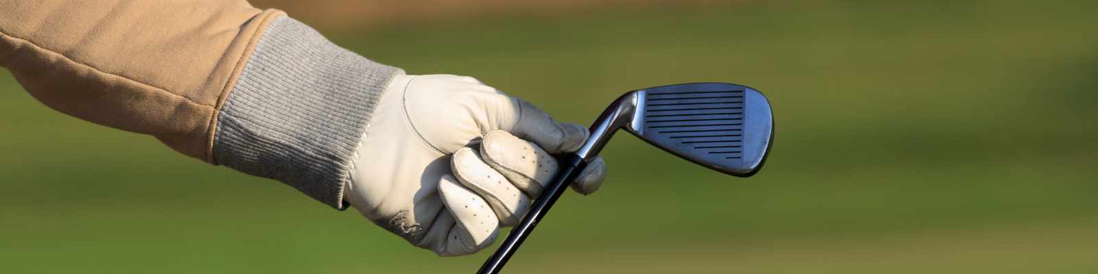 Golfschläger (photo by Stokkete / Shutterstock.com)